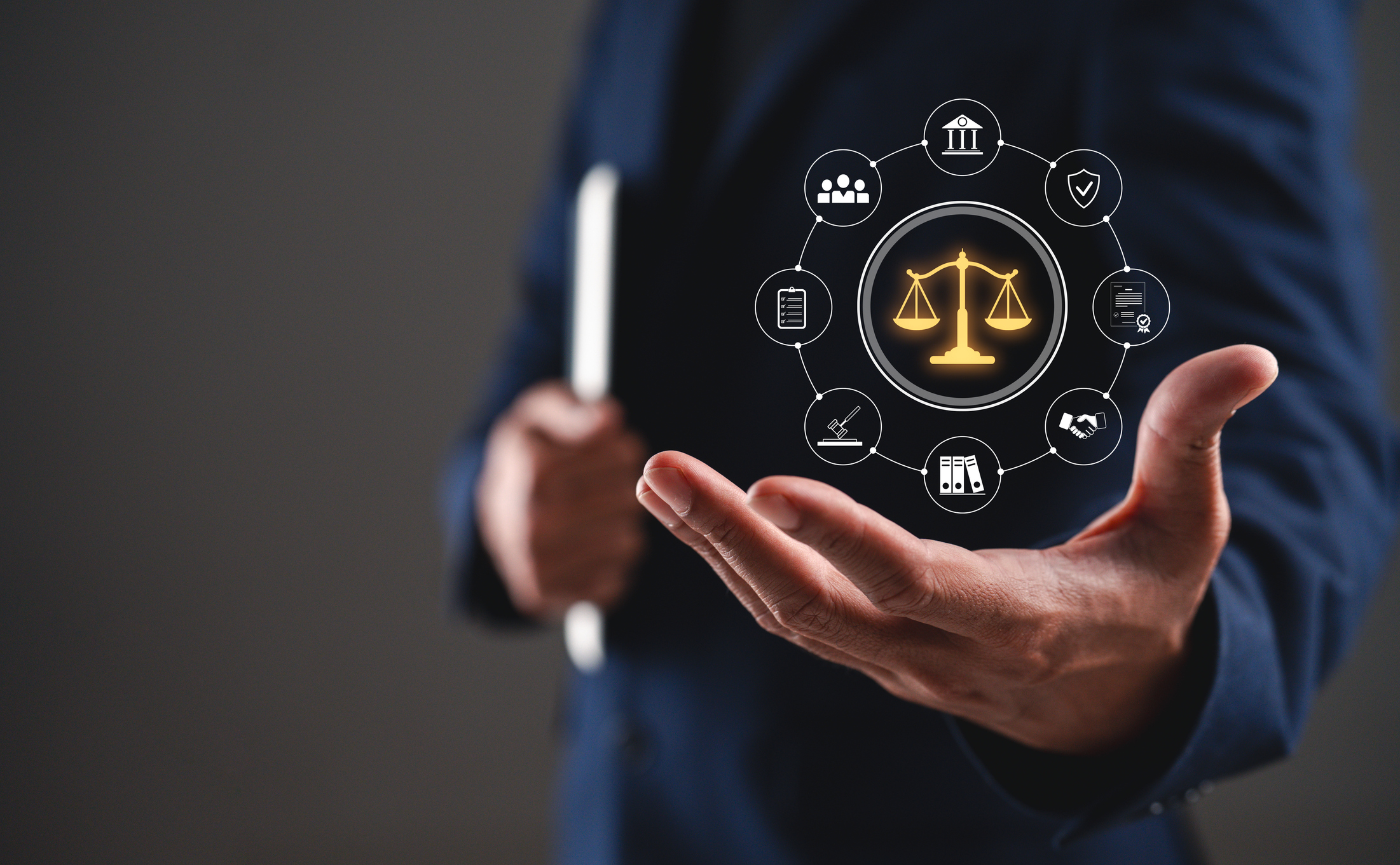 Legal scales hologram floating above hand